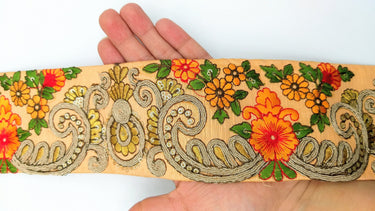 Peach Art Silk Fabric Trim With Orange, Green, Red And Gold Floral Embroidery